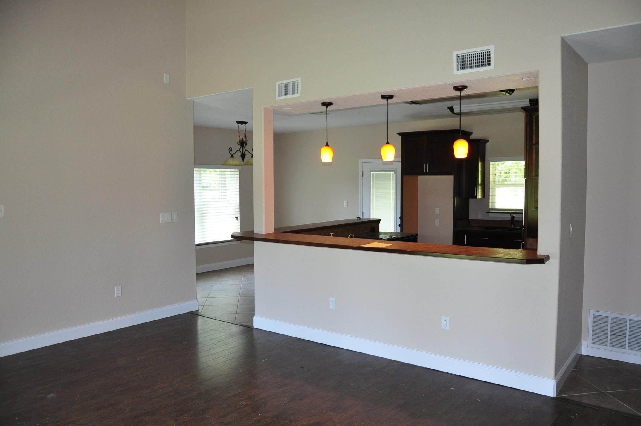3685 East Plympton Road Laurel Hill, FL 32567 - Photo 10 of 34 Breakfast bar with pendant lighting