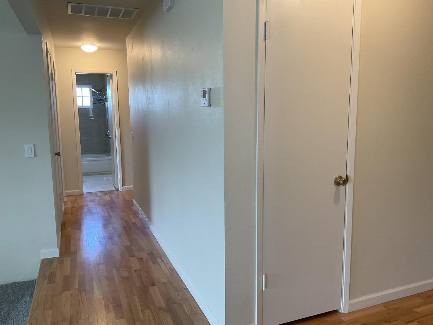 3057 Berney Drive Marina, CA 93933 - Photo 14 of 24 a view of a hallway with wooden floor