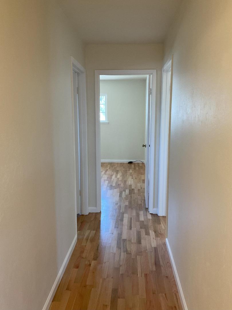 3057 Berney Drive Marina, CA 93933 - Photo 15 of 24 a view of a hallway with wooden floor