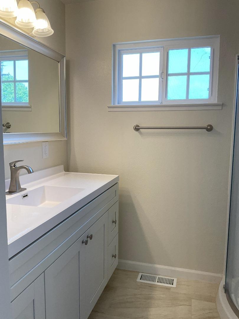 3057 Berney Drive Marina, CA 93933 - Photo 20 of 24 a bathroom with a sink and a window