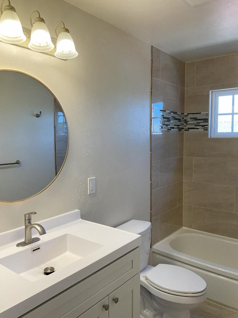 3057 Berney Drive Marina, CA 93933 - Photo 22 of 24 a bathroom with a sink toilet and shower