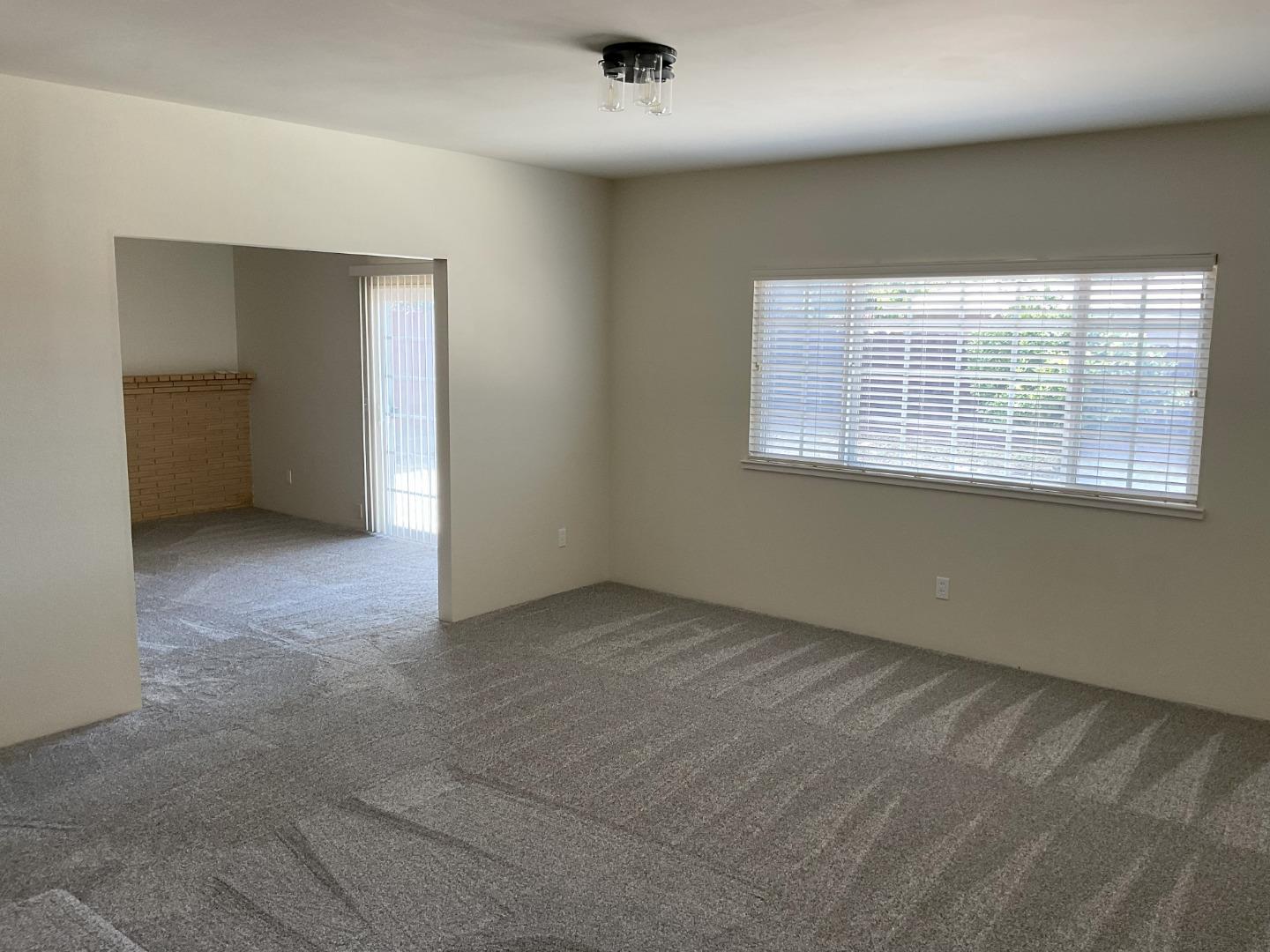 3057 Berney Drive Marina, CA 93933 - Photo 9 of 24 a view of an empty room with a window