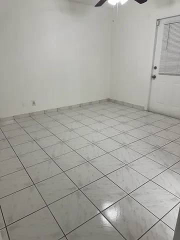 a kitchen with stainless steel appliances granite countertop a stove microwave and cabinets