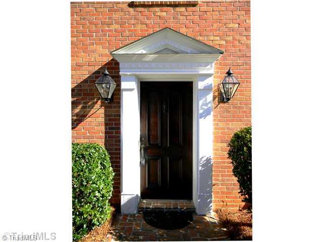 4925 Tower Road, Unit B Greensboro, NC 27410 - Photo 11 of 16 Exterior Front. The Front Door is a Beautiful Reclaimed Piece of History