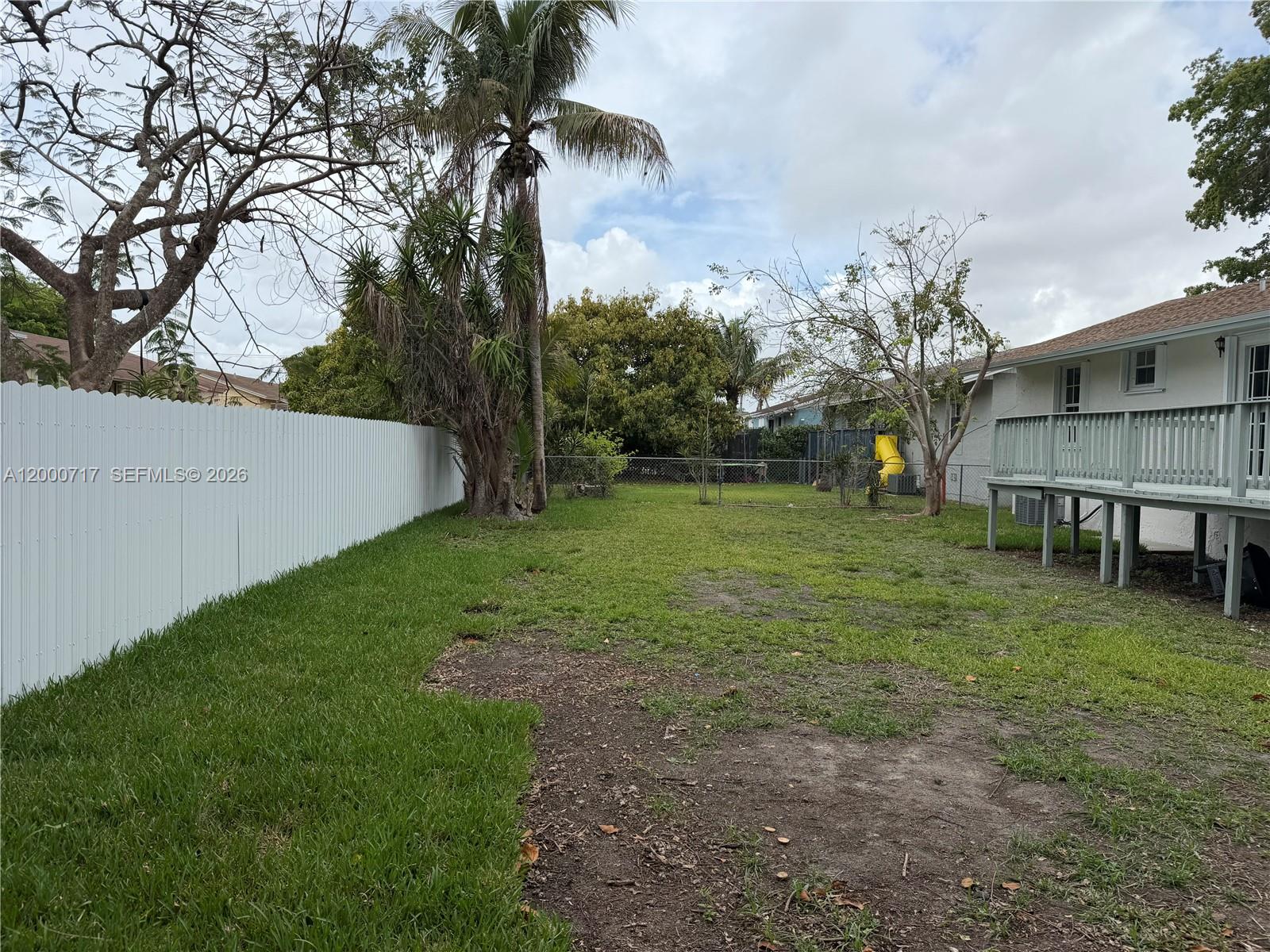 9760 Southwest 210th Street Cutler Bay, FL 33189 - Photo 12 of 17 a view of a backyard with large trees