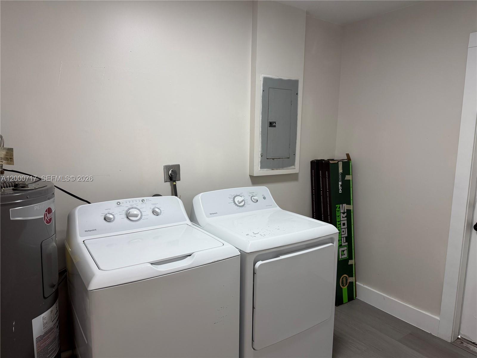 9760 Southwest 210th Street Cutler Bay, FL 33189 - Photo 14 of 17 a utility room with dryer and washer