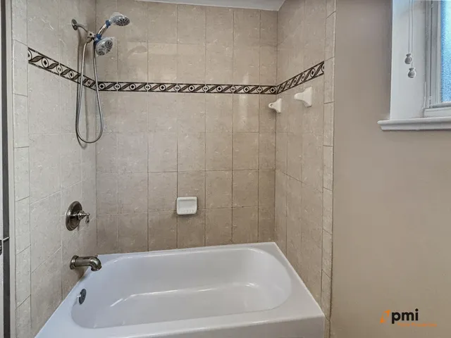 a view of a patio with a yard