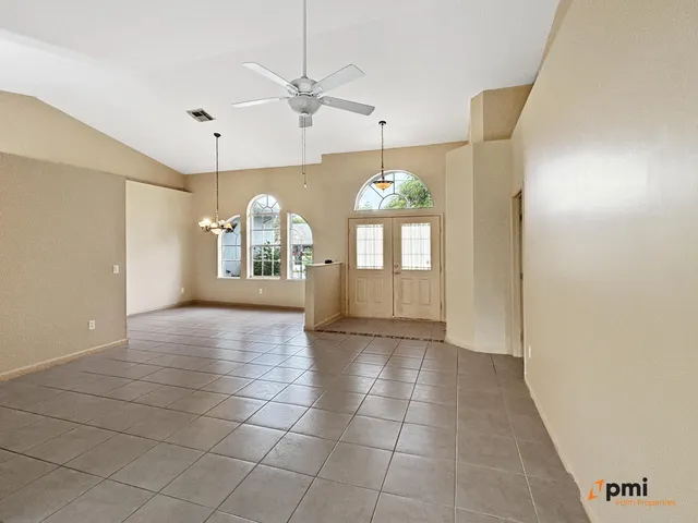 a view of a kitchen with a sink and a stove top oven