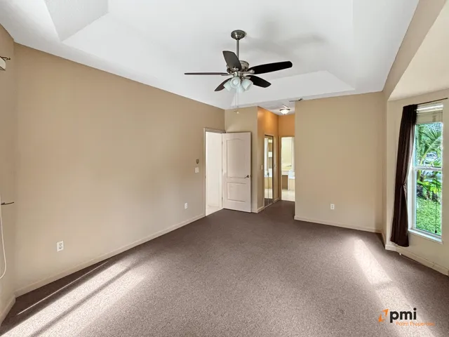 a bathroom with a sink a toilet and vanity