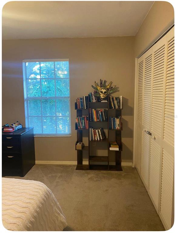 2859 Southwest 38th Place Gainesville, FL 32608 - Photo 6 of 10 a room with musical instruments