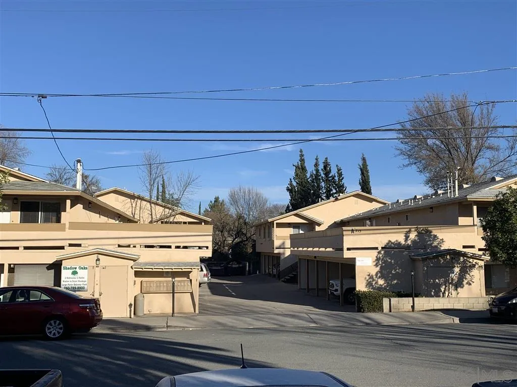 a view of a street with houses