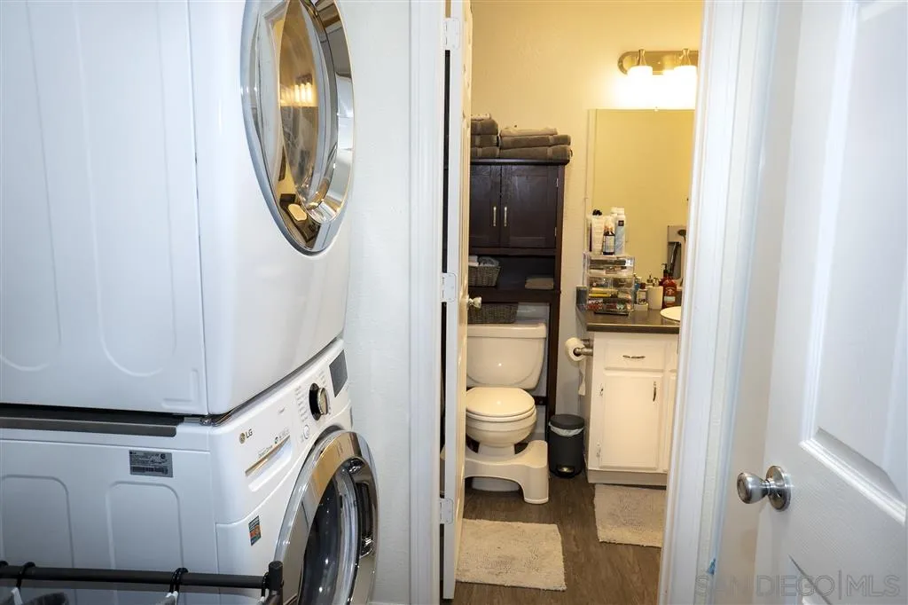 715 B Street Ramona, CA 92065 - Photo 16 of 21 a bathroom with a toilet and a sink