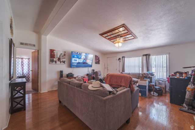 445 South Main Street Fayette, UT 84630 - Photo 30 of 45 Living room with wood finished floors and lofted ceiling