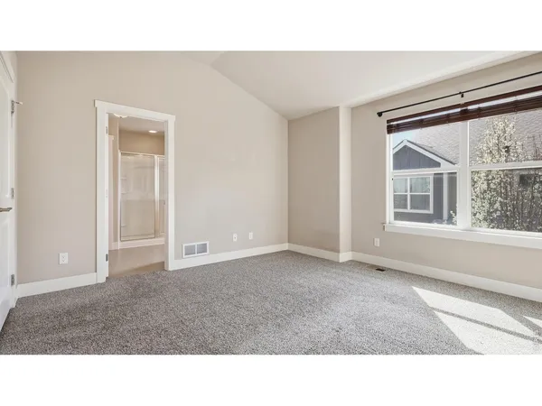 a black and white photo of a living room