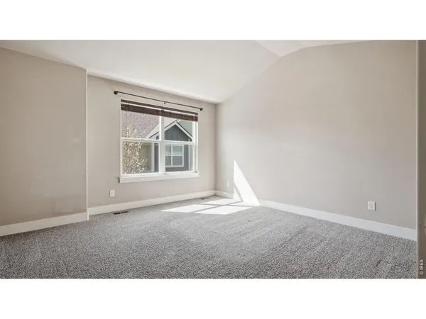 a black and white photo of a living room