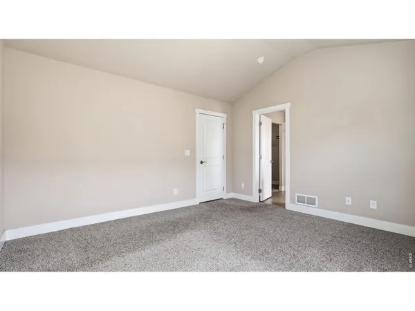 a open hall with a ceiling fan
