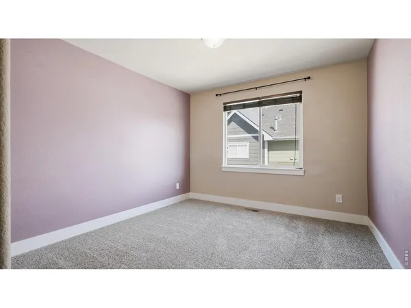 a black and white photo of a living room