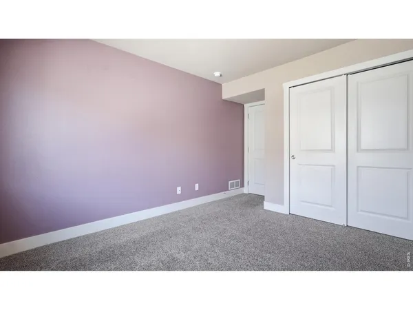 a black and white photo of a big room