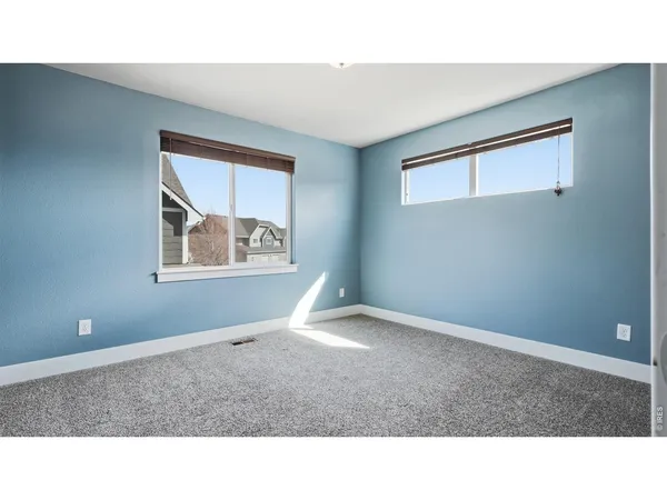 a black and white photo of a living room