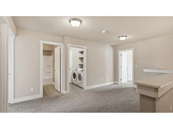 a black and white photo of a living room