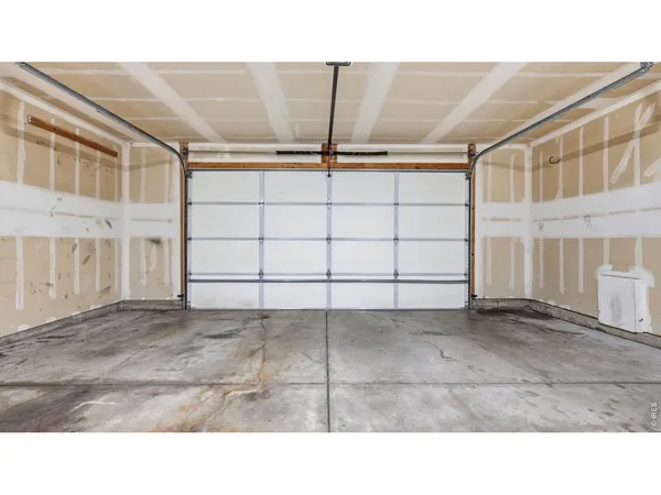 a black and white photo of a big room