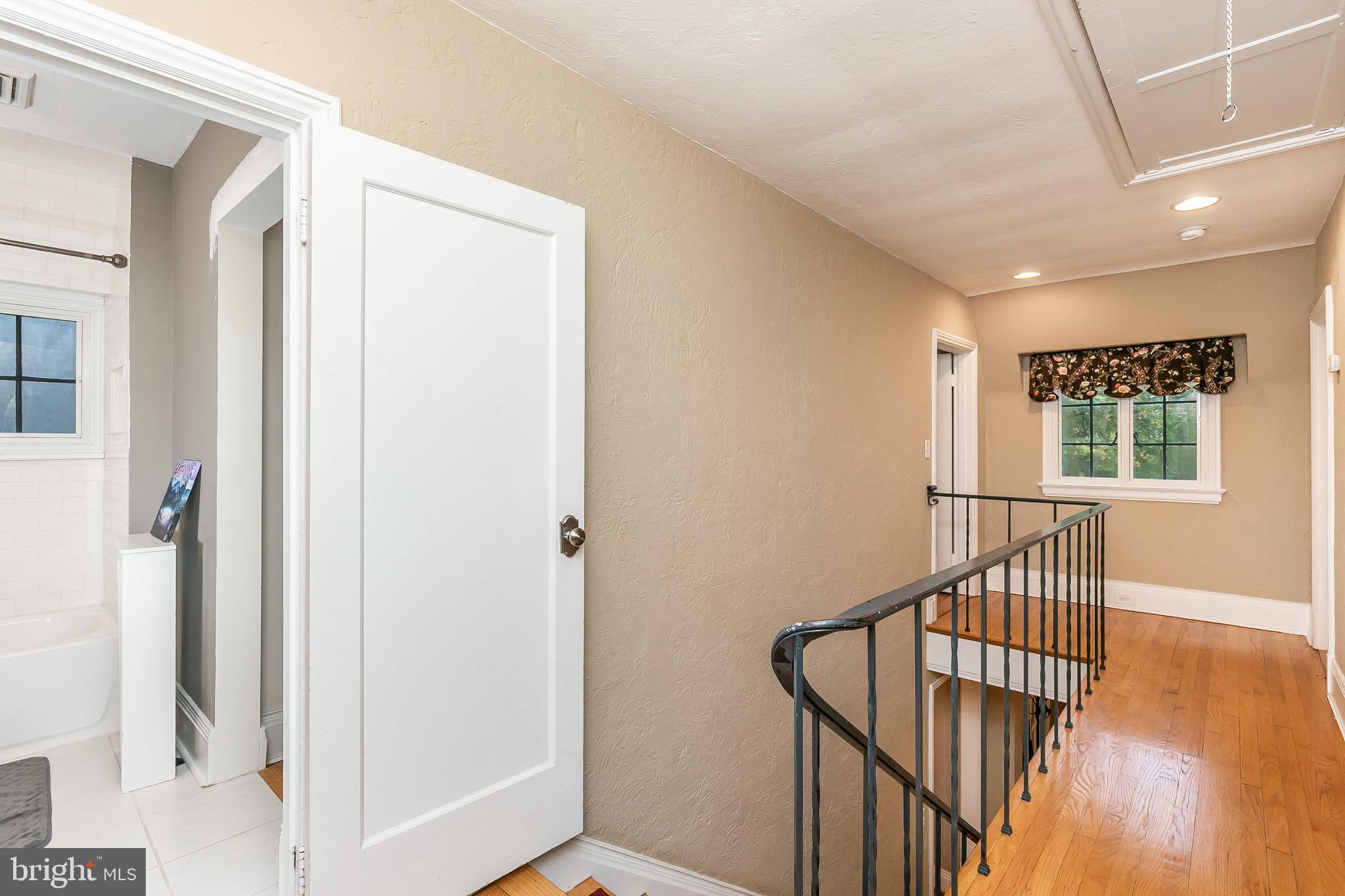 314 Taplow Road Baltimore, MD 21212 - Photo 33 of 47 Upstairs hallway with attic access