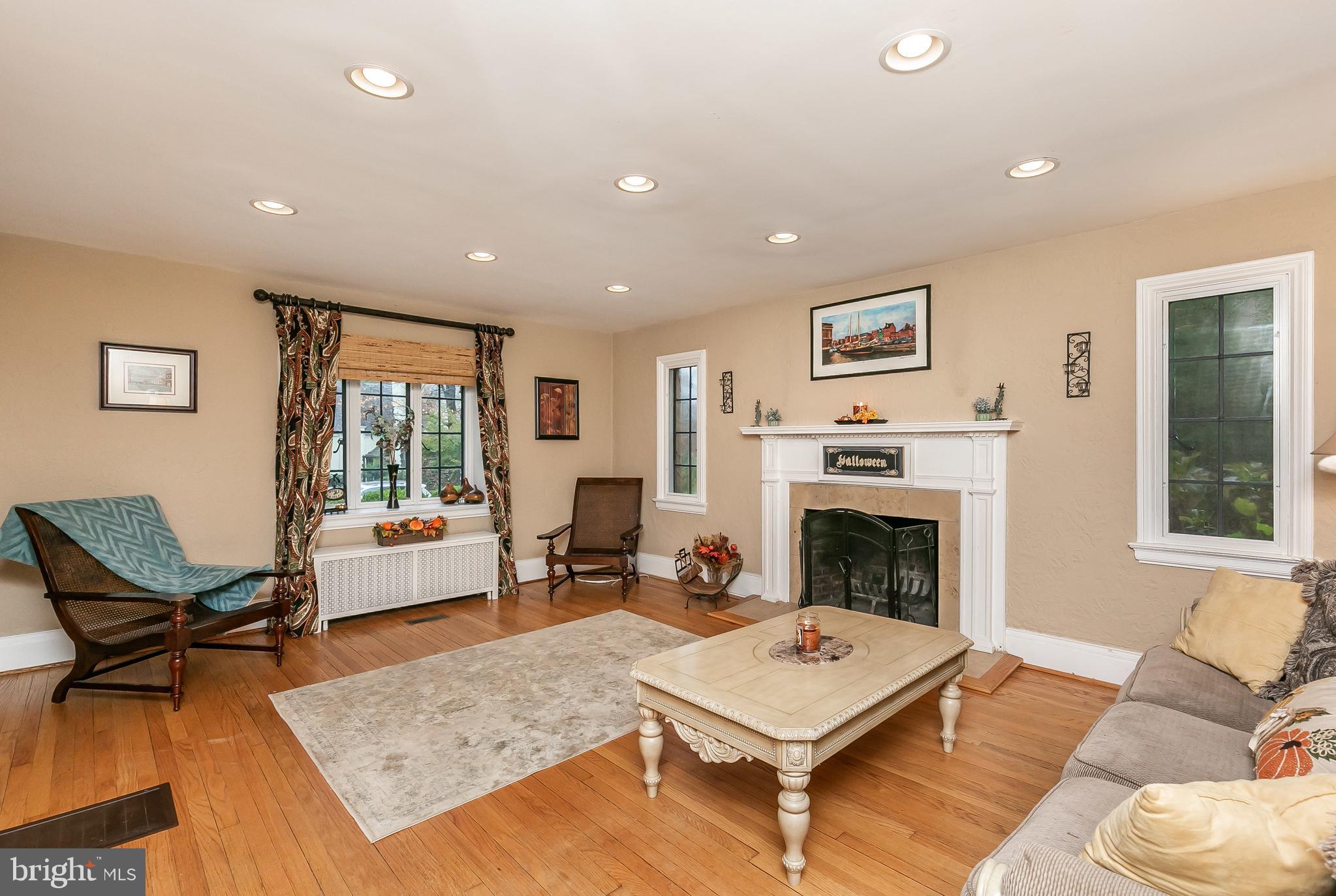 314 Taplow Road Baltimore, MD 21212 - Photo 5 of 47 Large living room with wood burning fireplace