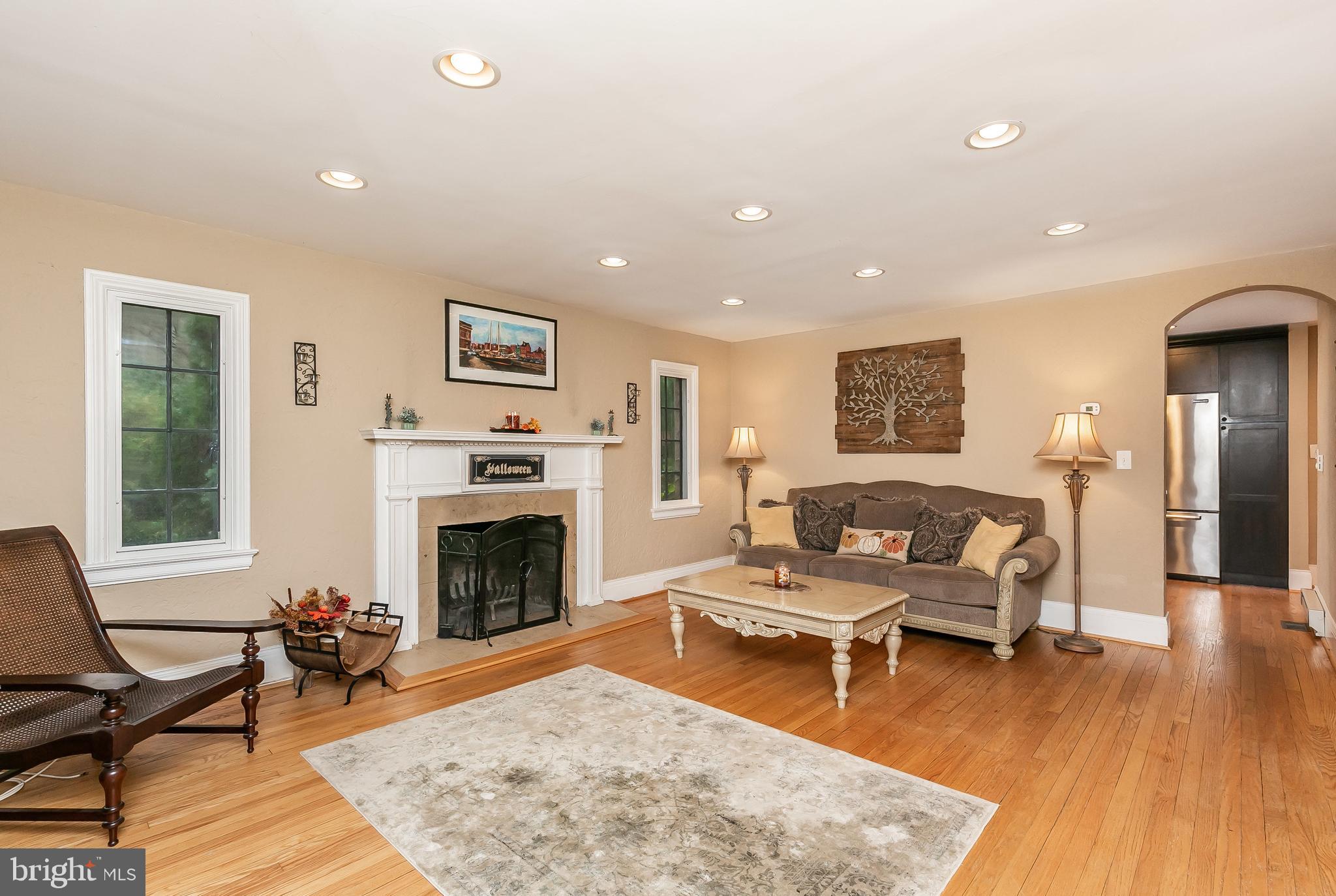 314 Taplow Road Baltimore, MD 21212 - Photo 6 of 47 Living room leads right to renovated kitchen