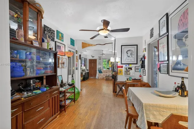 a kitchen view of a dining table and chairs