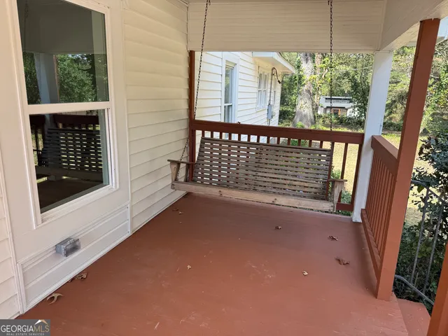 a view of a balcony with an outdoor space