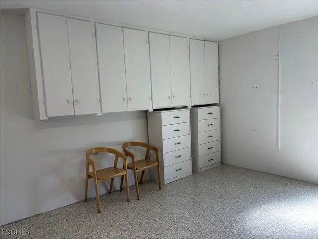 a view of a livingroom with furniture