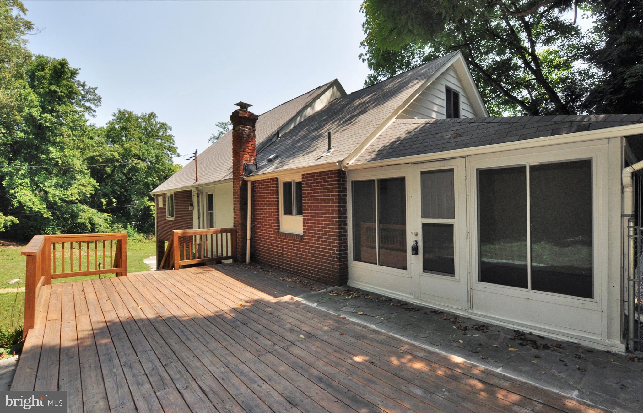 6221 Walhonding Road Bethesda, MD 20816 - Photo 11 of 33 A large deck just off the kitchen and Breakfast Rm