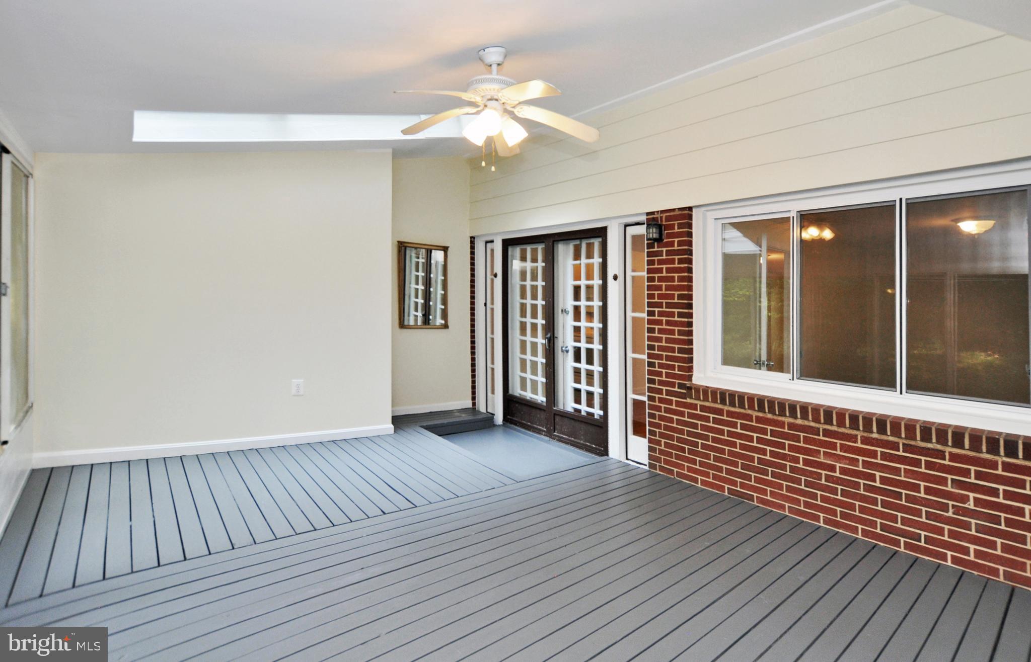 6221 Walhonding Road Bethesda, MD 20816 - Photo 20 of 33 Sunroom leading to Foyer