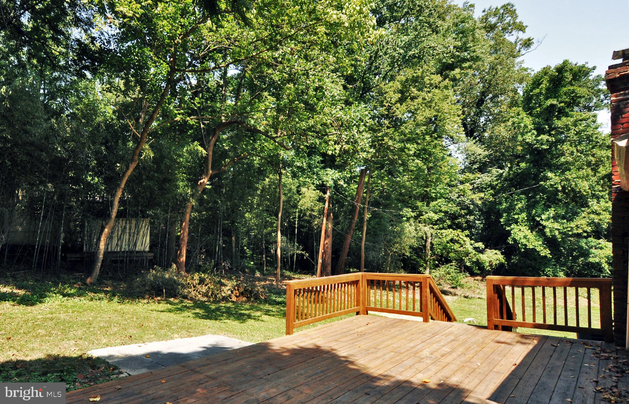 6221 Walhonding Road Bethesda, MD 20816 - Photo 32 of 33 Deck leading to Side Entry and Eating Area