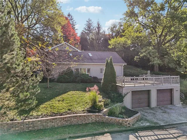 a view of a garden with a lake