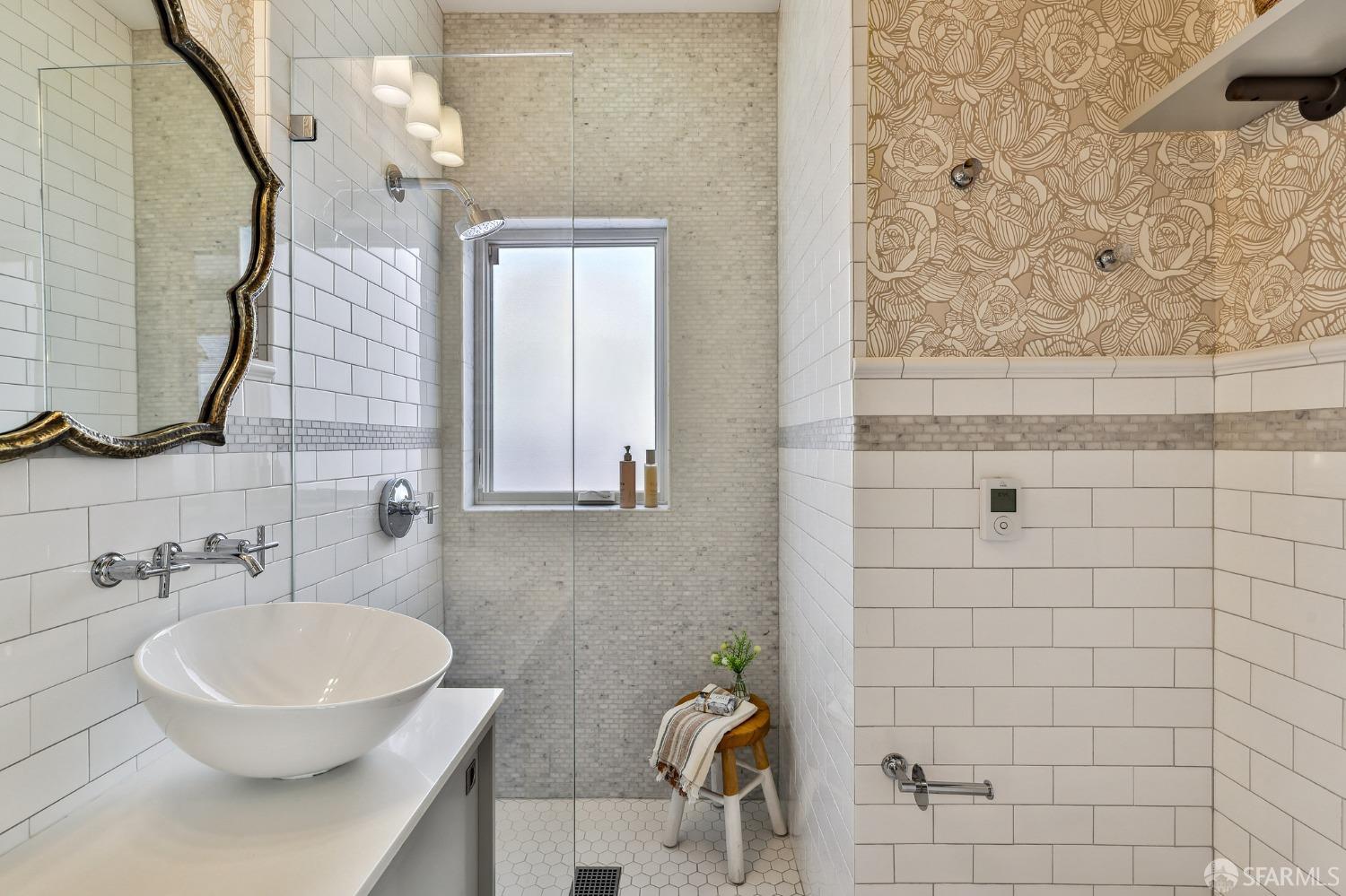 216 Ellsworth Street San Francisco, CA 94110 - Photo 17 of 76 a bathroom with a sink a toilet and mirror