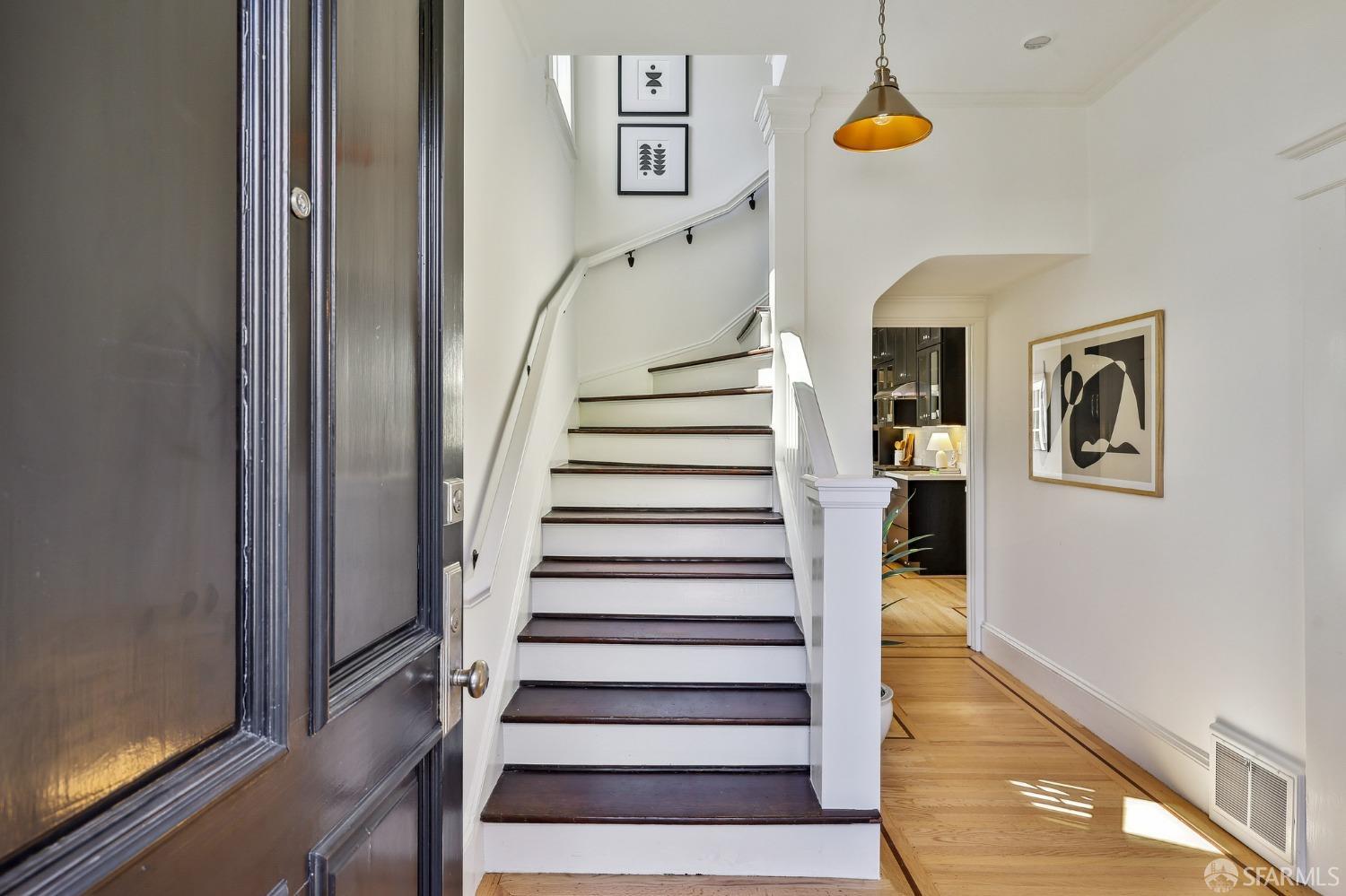 216 Ellsworth Street San Francisco, CA 94110 - Photo 2 of 76 a view of entryway with furniture and wooden floor