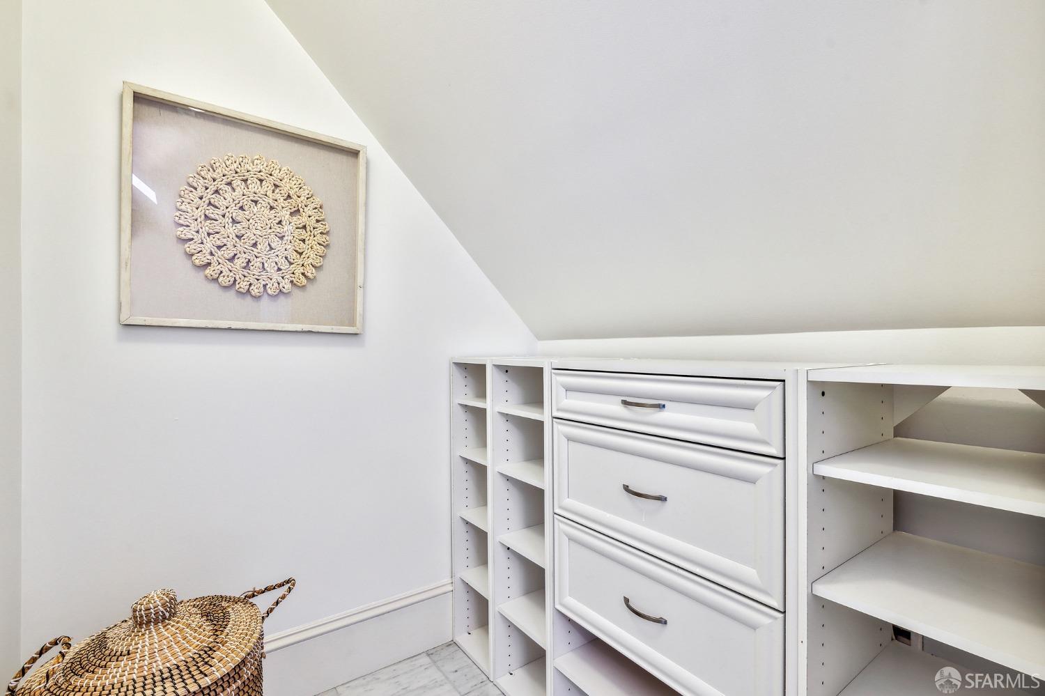 216 Ellsworth Street San Francisco, CA 94110 - Photo 32 of 76 a view of walk in closet with empty racks