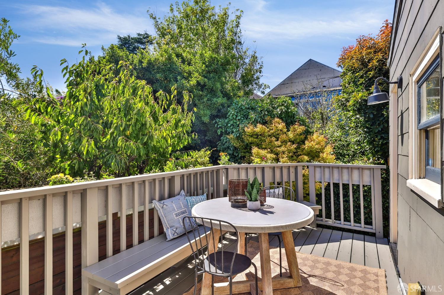 216 Ellsworth Street San Francisco, CA 94110 - Photo 34 of 76 a view of a table and chairs in the balcony