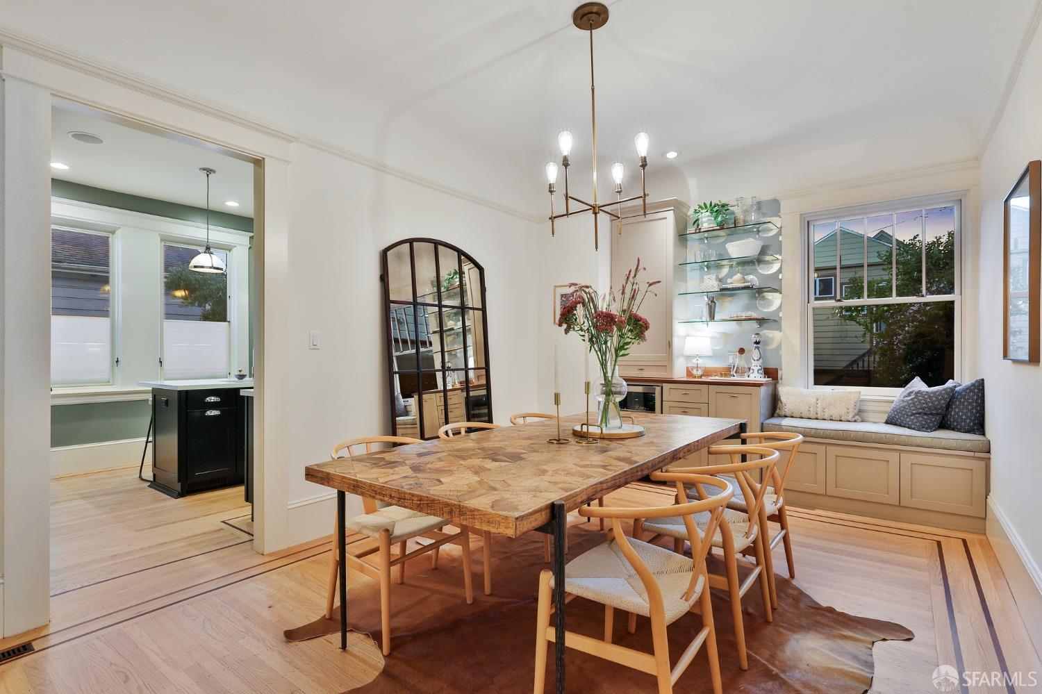 216 Ellsworth Street San Francisco, CA 94110 - Photo 47 of 76 a view of a dining room with furniture window and wooden floor