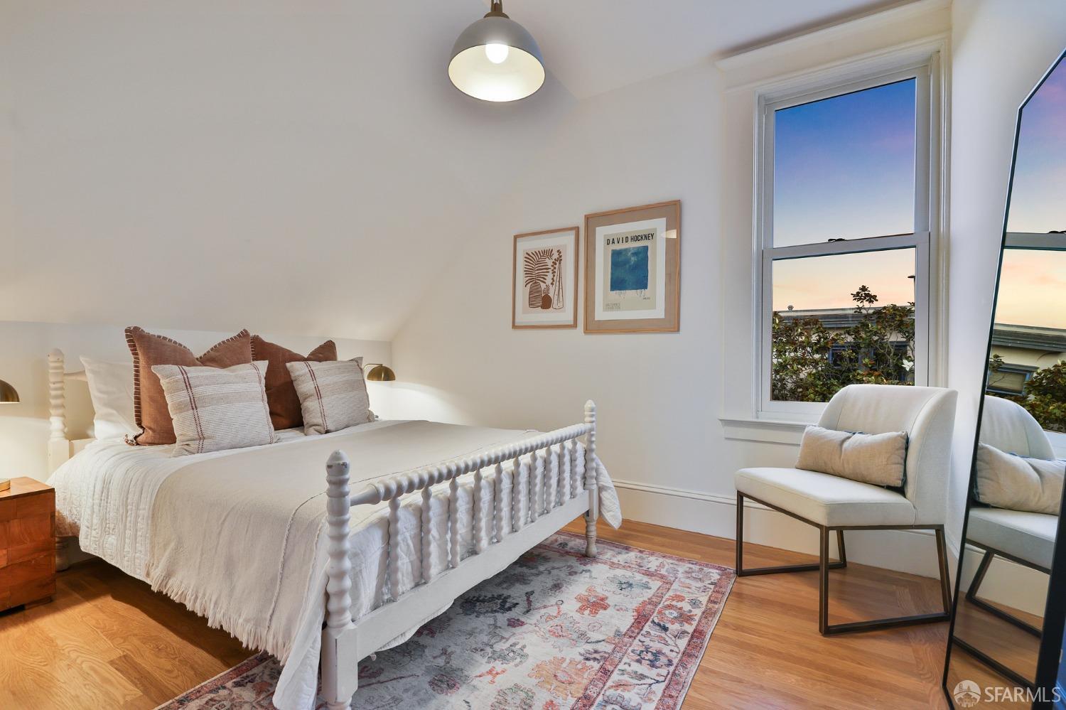 216 Ellsworth Street San Francisco, CA 94110 - Photo 50 of 76 a bedroom with a bed and window