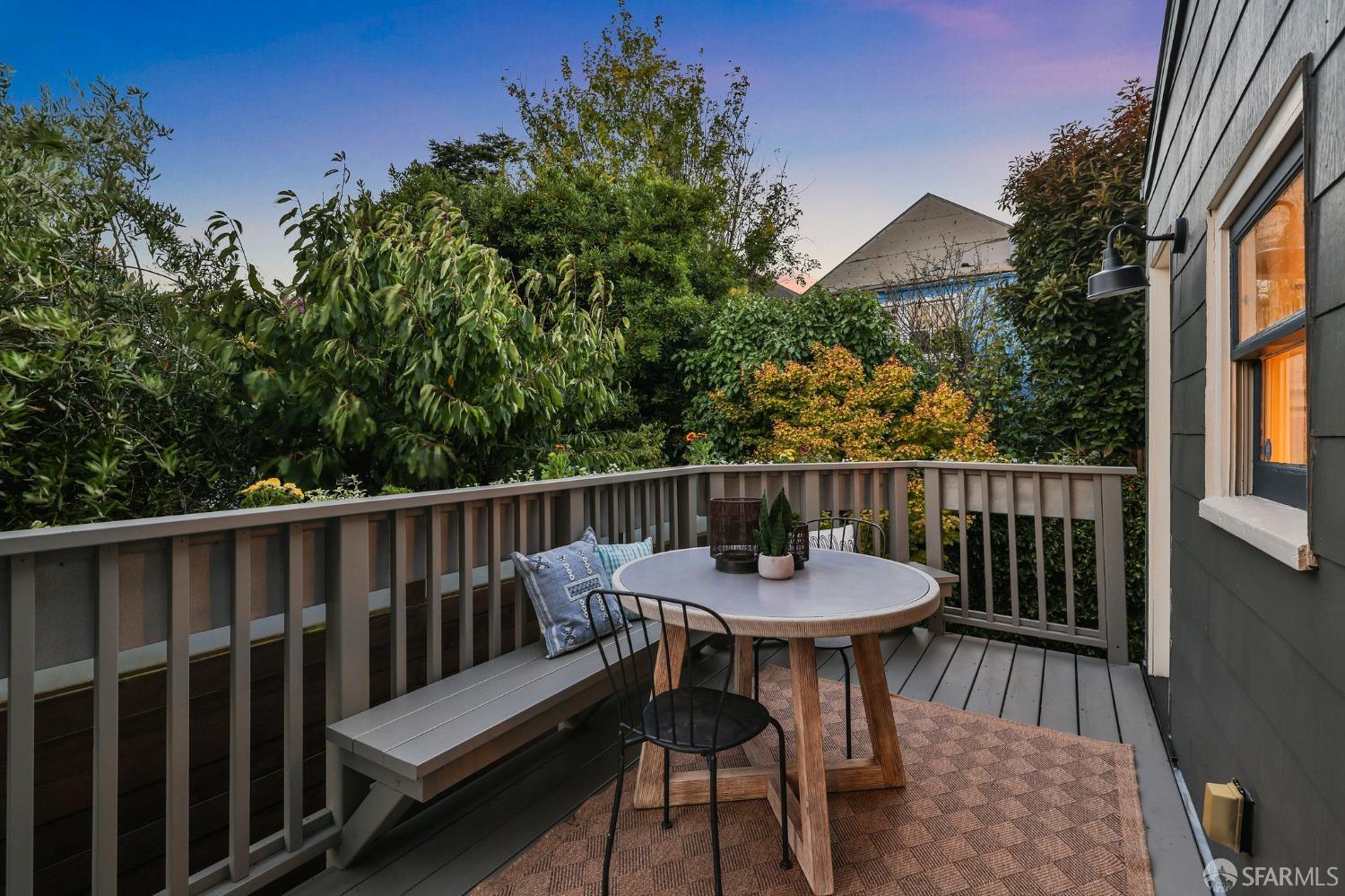 216 Ellsworth Street San Francisco, CA 94110 - Photo 52 of 76 a view of a chair and table on the deck