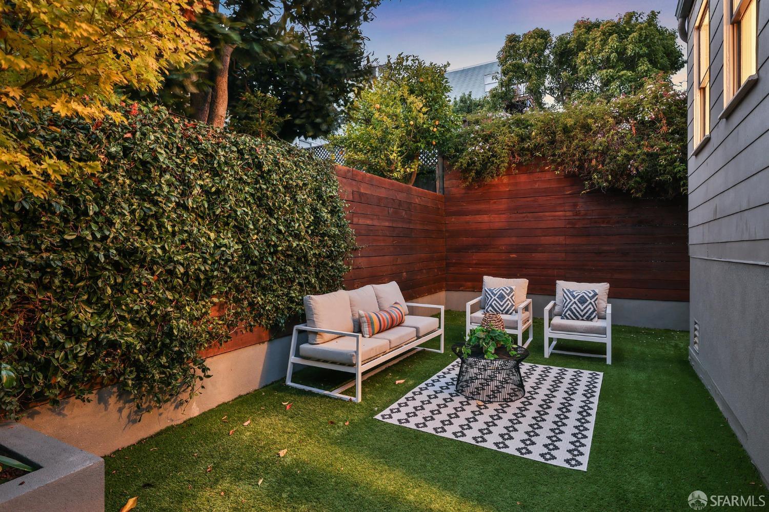 216 Ellsworth Street San Francisco, CA 94110 - Photo 59 of 76 a view of a bench in the backyard