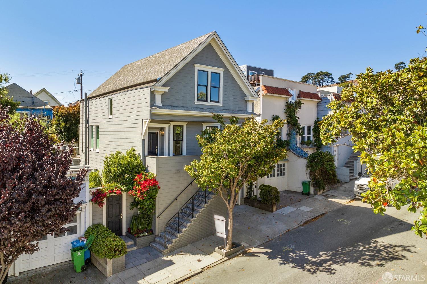 216 Ellsworth Street San Francisco, CA 94110 - Photo 63 of 76 a front view of a house with a yard
