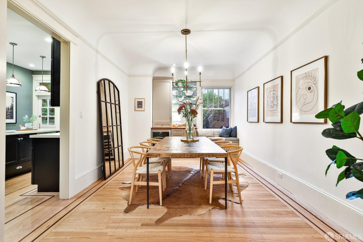 216 Ellsworth Street San Francisco, CA 94110 - Photo 7 of 76 a view of a dining room with furniture window and wooden floor