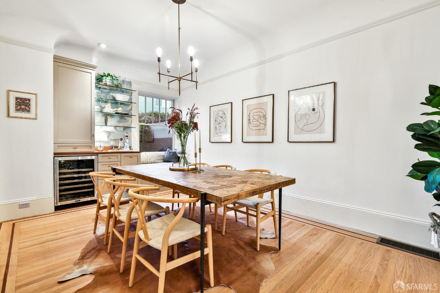 216 Ellsworth Street San Francisco, CA 94110 - Photo 8 of 76 a view of a dining room with furniture window and wooden floor