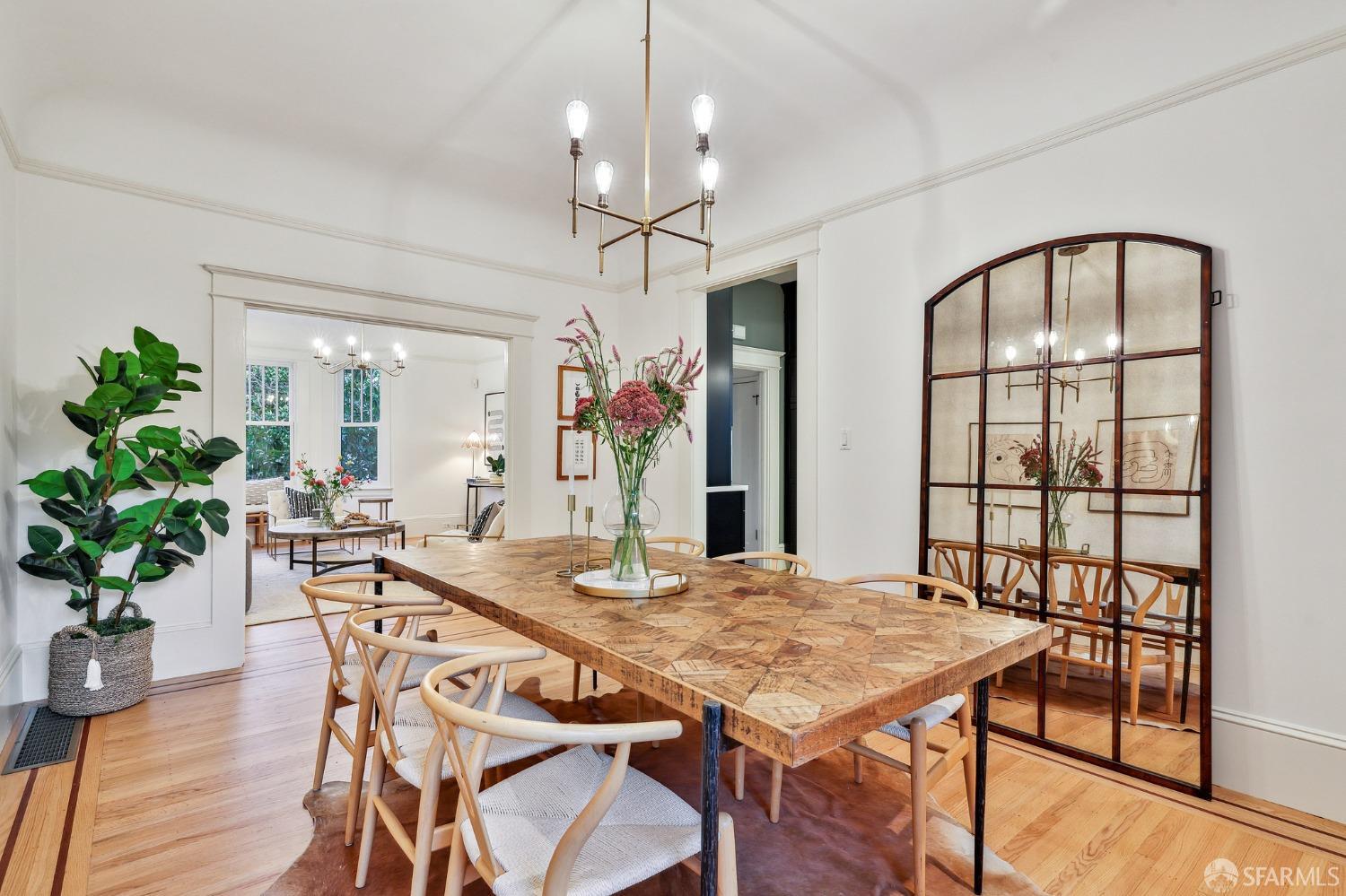 216 Ellsworth Street San Francisco, CA 94110 - Photo 9 of 76 a view of a dining room with furniture window and wooden floor