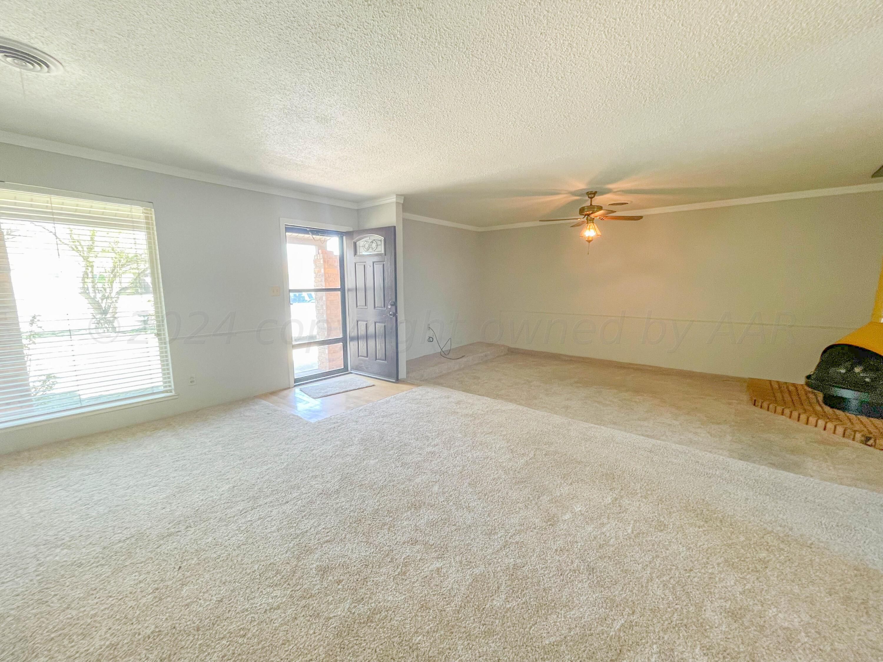 5301 Allen Street Amarillo, TX 79110 - Photo 3 of 28 an empty room with windows