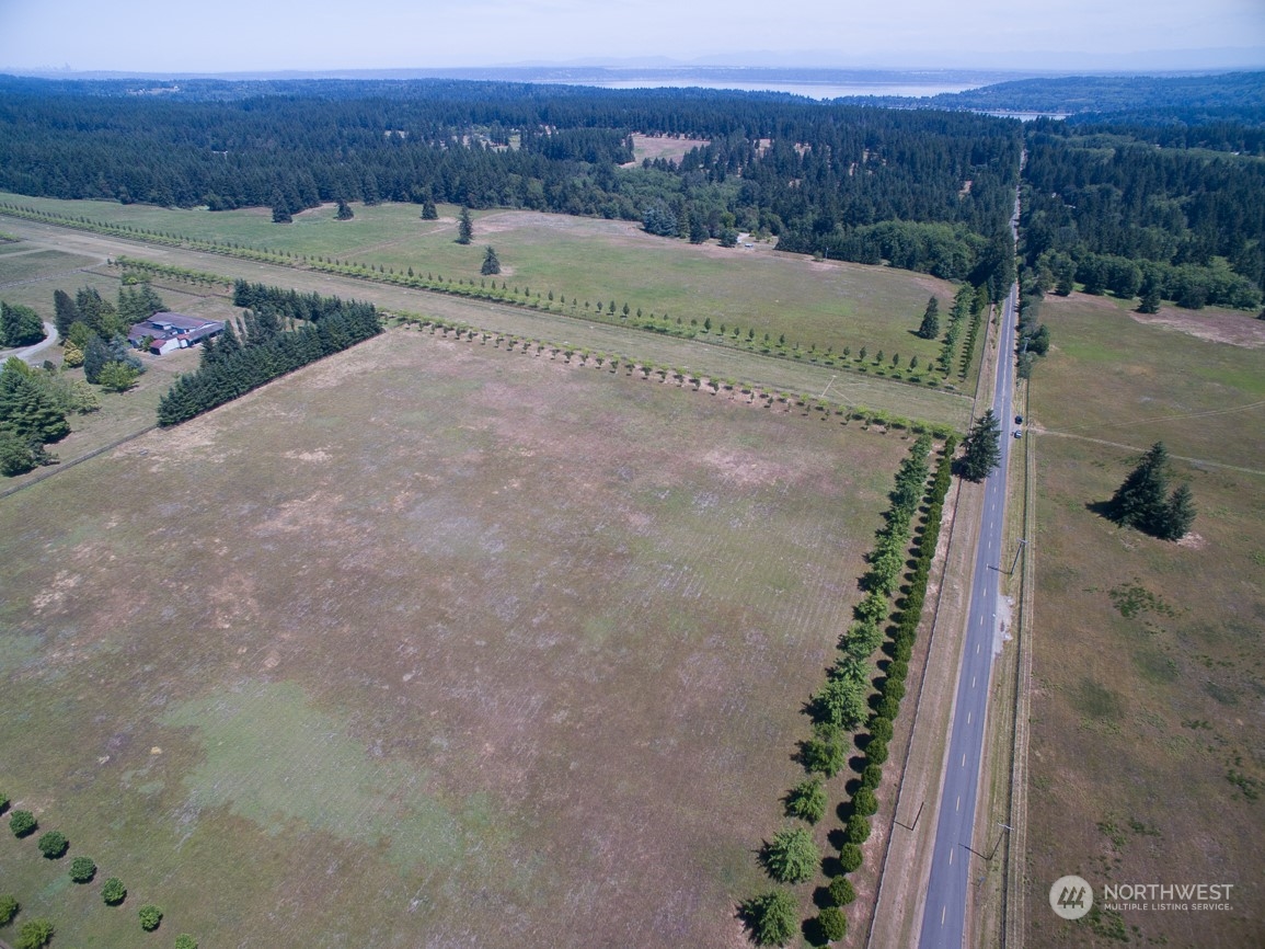 22710 Wax Orchard Road Southwest Vashon, WA 98070 - Photo 3 of 21 a view of a road with an ocean view