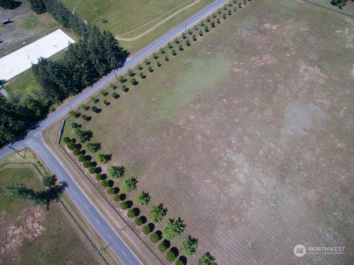 22710 Wax Orchard Road Southwest Vashon, WA 98070 - Photo 4 of 21 a picture of a yard with plants